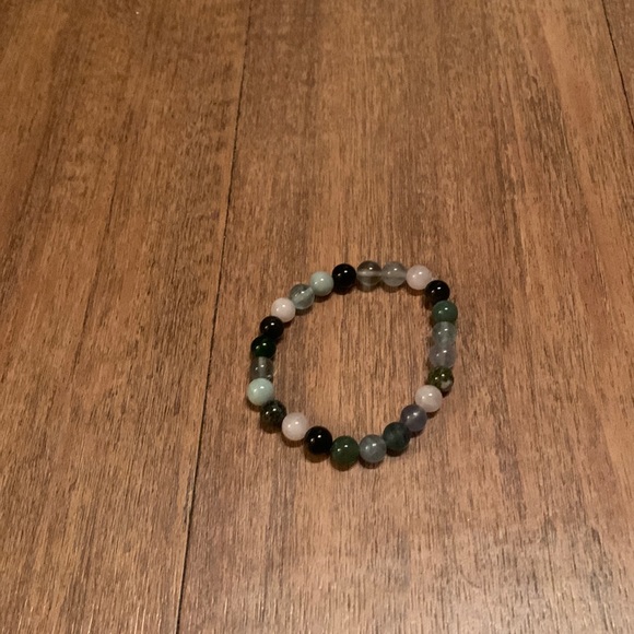 Rose quartz, jade, rainbow obsidian,and fluorite make up this bracelet. - Picture 1 of 1